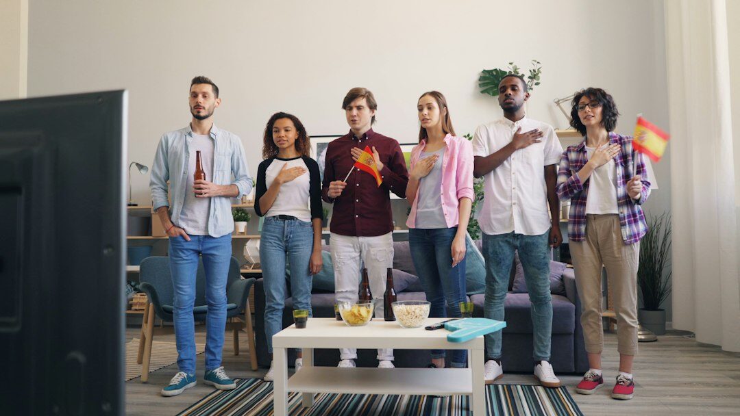 group watching tv